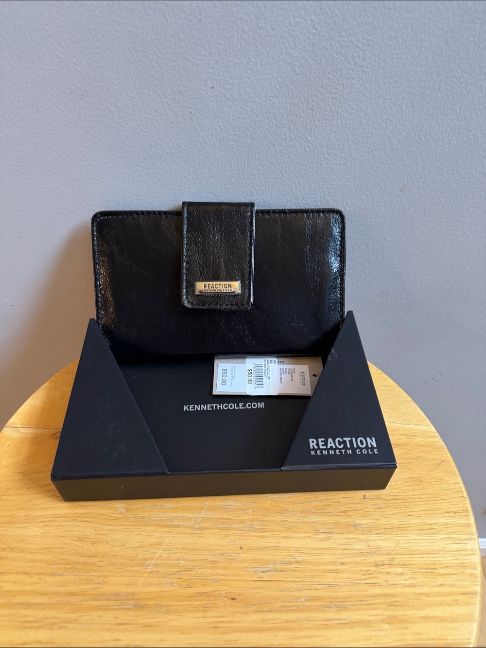 Reaction Kenneth Cole Black Patent Bifold Wallet with Logo Plaque